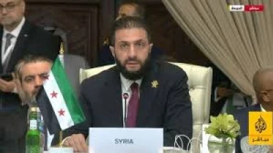الشرع في قمة الدوحة يعلن تضامن سوريا مع قطر ويستشهد ببيت شعر