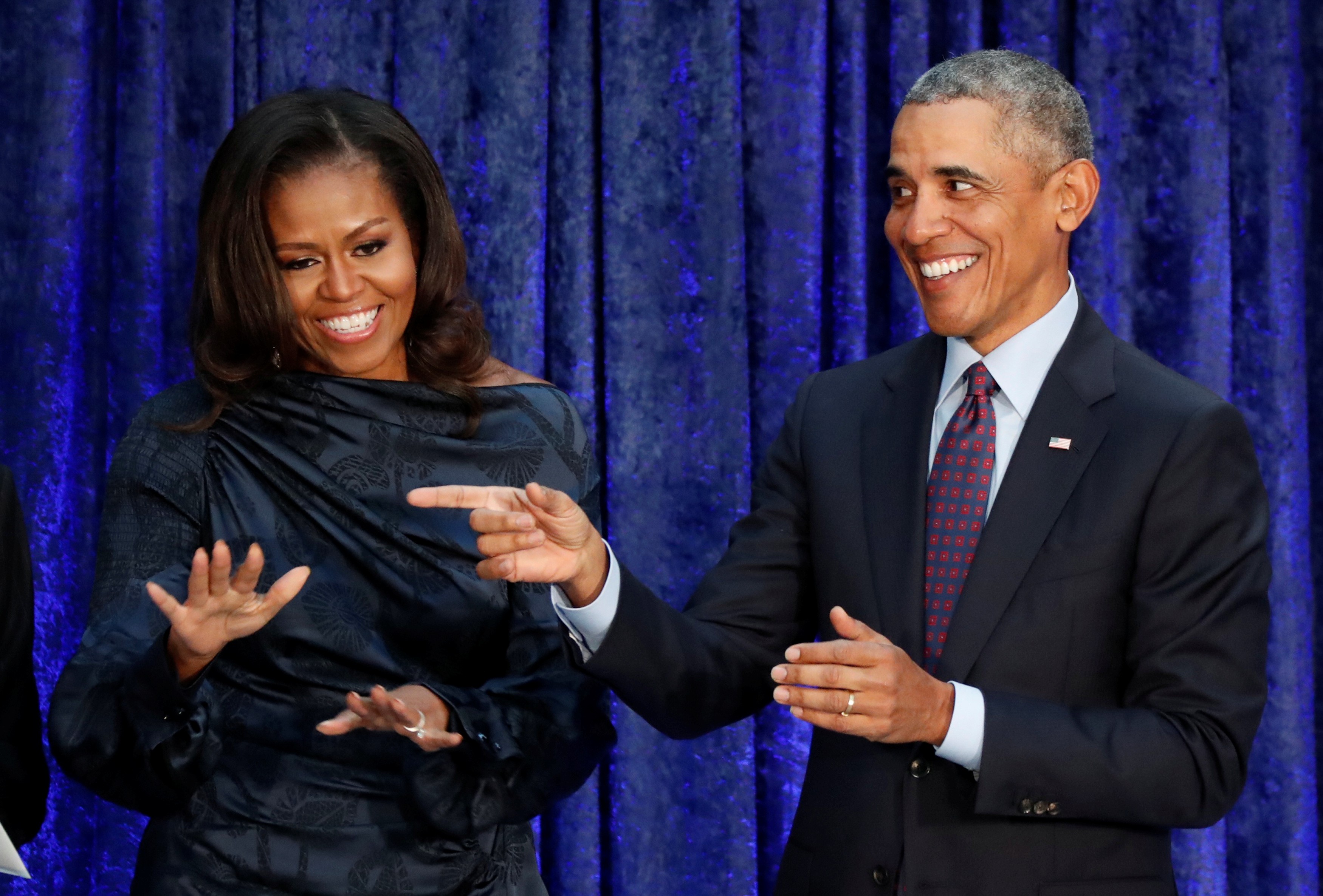 الرئيس الأمريكي الأسبق باراك أوباما وزوجته ميشيل (إنترنت)