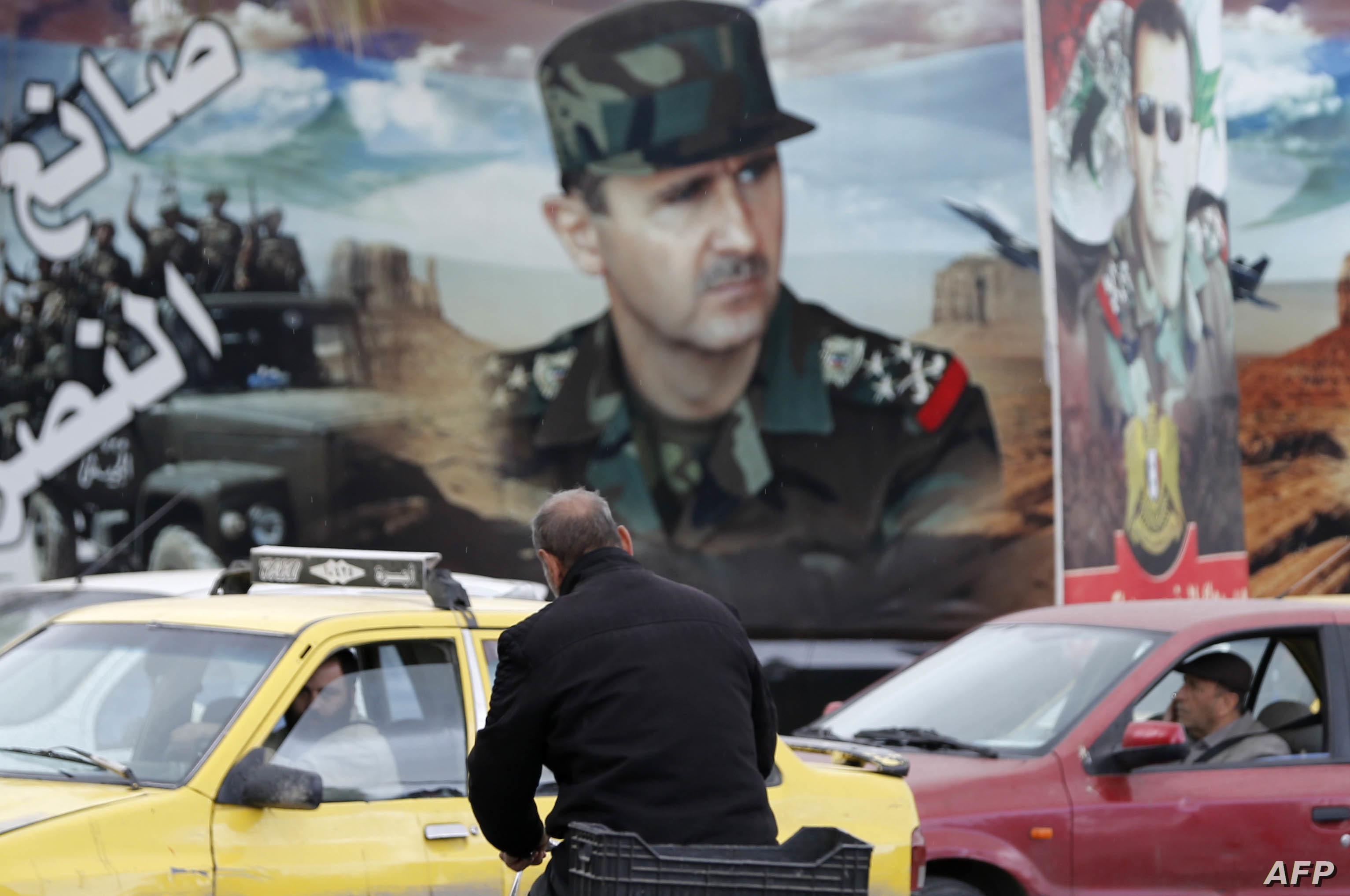 صورة طرقية لرأس النظام بشار الأسد (إنترنت)