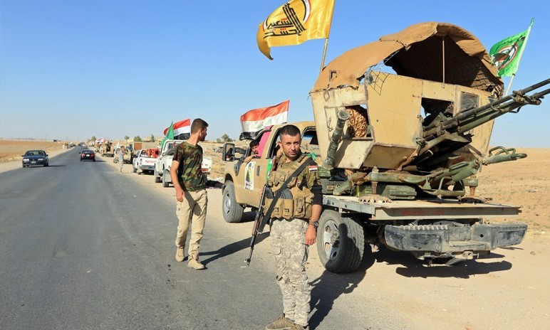 عناصر من الحشد الشعبي العراقي في أثناء العمليات ضد تنظيم الدولة في العراق - 2017 (رويترز)