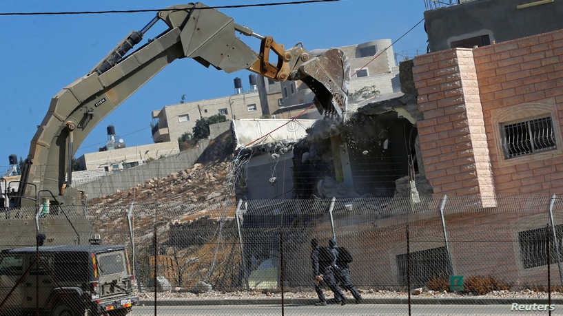 منازل فلسطينية يتم هدمها من قبل اسرائيل
