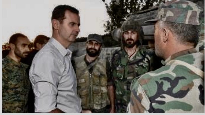 بشار الأسد مع جنوده (انترنت)