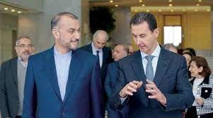 رئيس النظام السوري بشار الاسد مع وزير خارجية ايران أمير عبد اللهيان