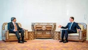 وزير الخارجية الأماراتي عبد الله بن زايد ورئيس النظام السوري بشار الأسد