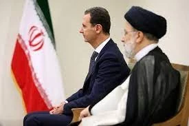 الرئيس الإيراني ابراهيم رئيسي ورئيس النظام السوري بشار الأسد