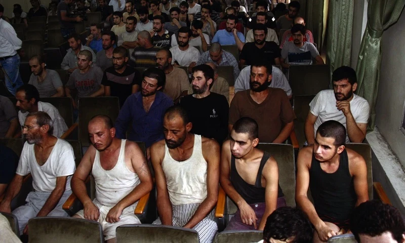 معتقلين في سجن صيدنايا