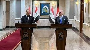 وزير الخارجية العراقي فؤاد حسين ووزير خارجية النظام السوري فيصل المقداد