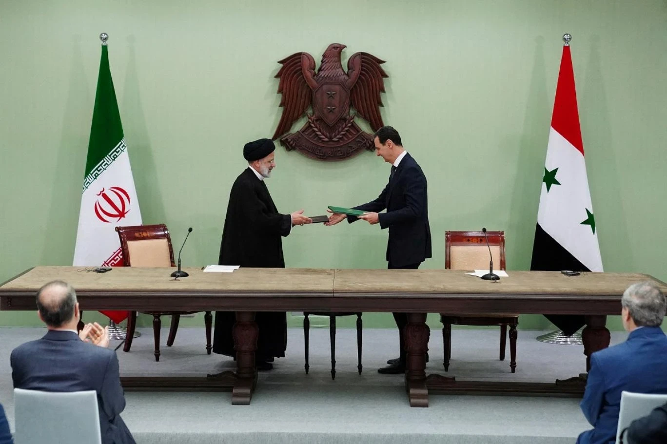 توقيع اتفاقيات بين النظام السوري وإيران