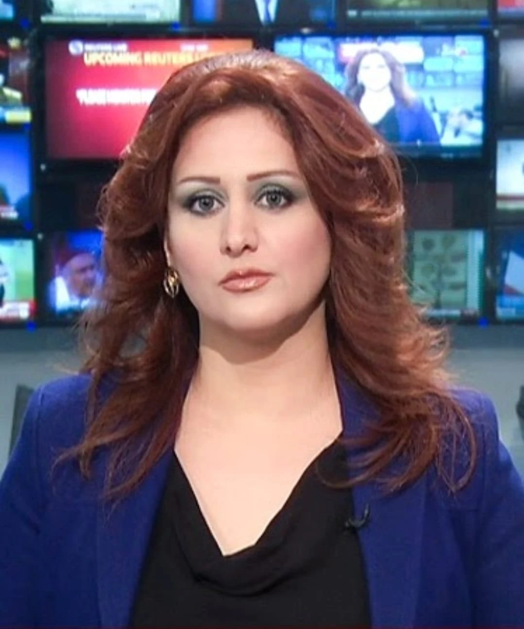 الإعلامية ورئيسة اتحاد المرأة السورية رزان أمين