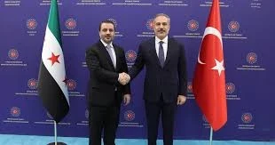 وزير الخارجية التركي هاكان فيدان ووزير الخارجية السوري أسعد الشيباني