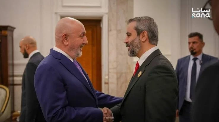 وزير الخارجية السوري اسعد الشياني ورئيس العراق نزار محمد سعيد أميدي