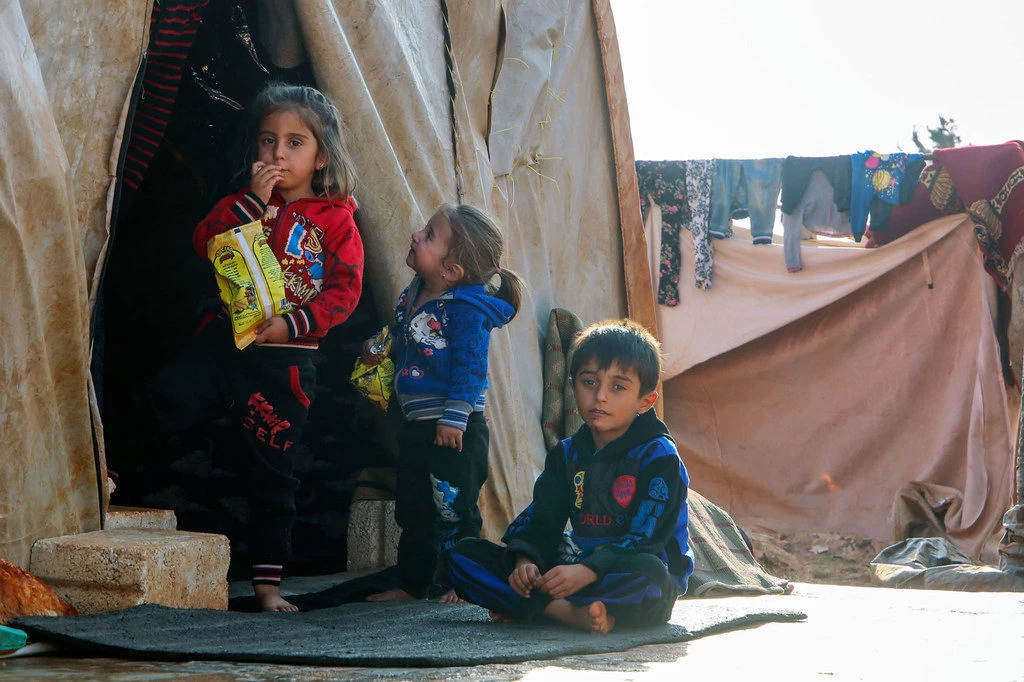 أطفال سوريون في مخيم للاجئين(وكالات)